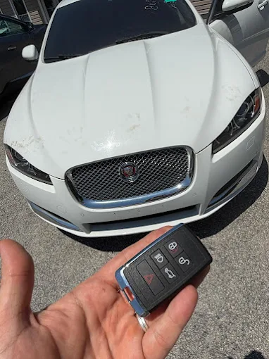Replacement smart key programmed for a white Jaguar XF sedan